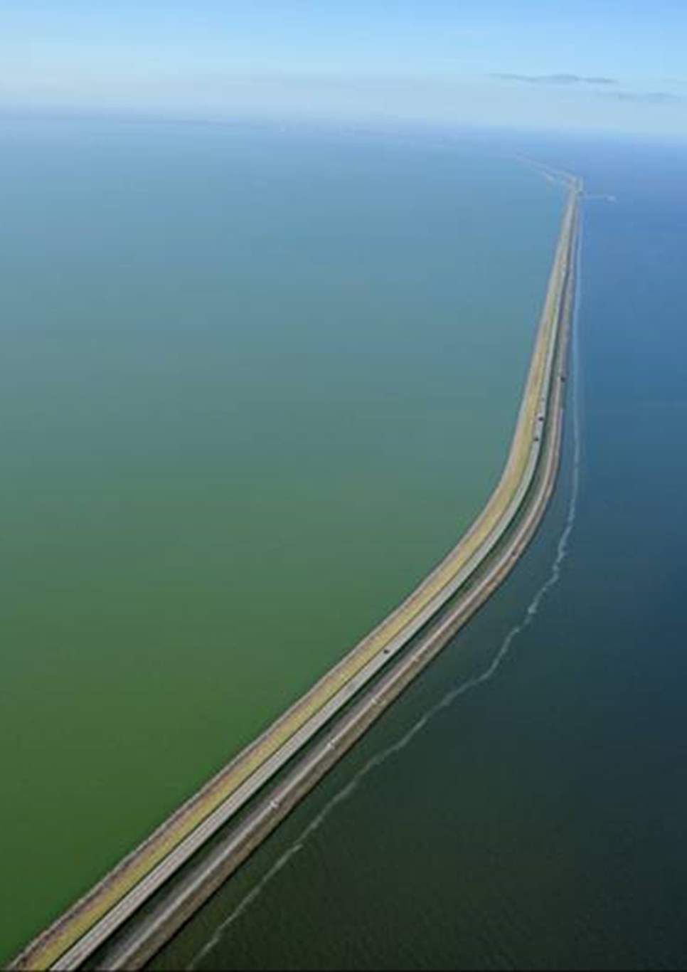 A aereal photo of the Houtribdijk crossing the IJsselmeer.